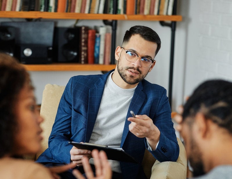 A male clinical social worker doing family practice
