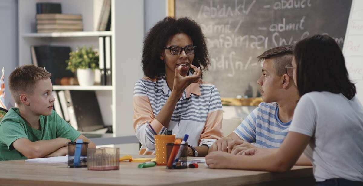 Speech-Language Pathologist working with students