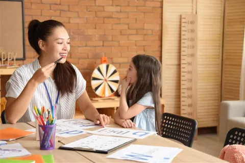 SLP working with child