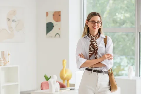 A young professional woman who enjoys helping people and is trying to decide if she should become a social worker or a licensed counselor