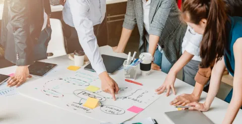 Group of marketing professionals at brainstorming meeting